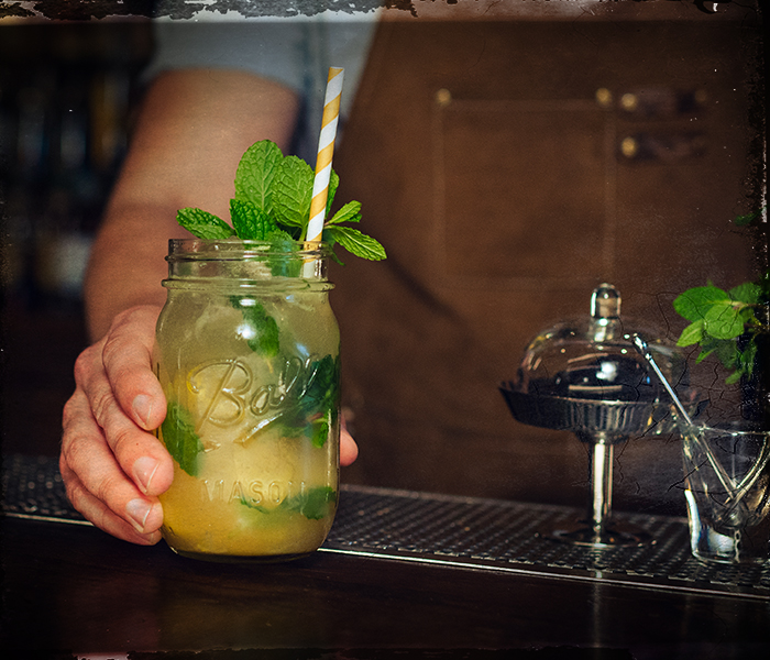 bartender serving mixed drink indiana summer